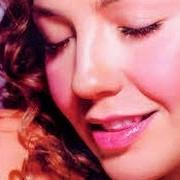 El texto musical REGRESA A MÍ de THALIA también está presente en el álbum Arrasando (2000)